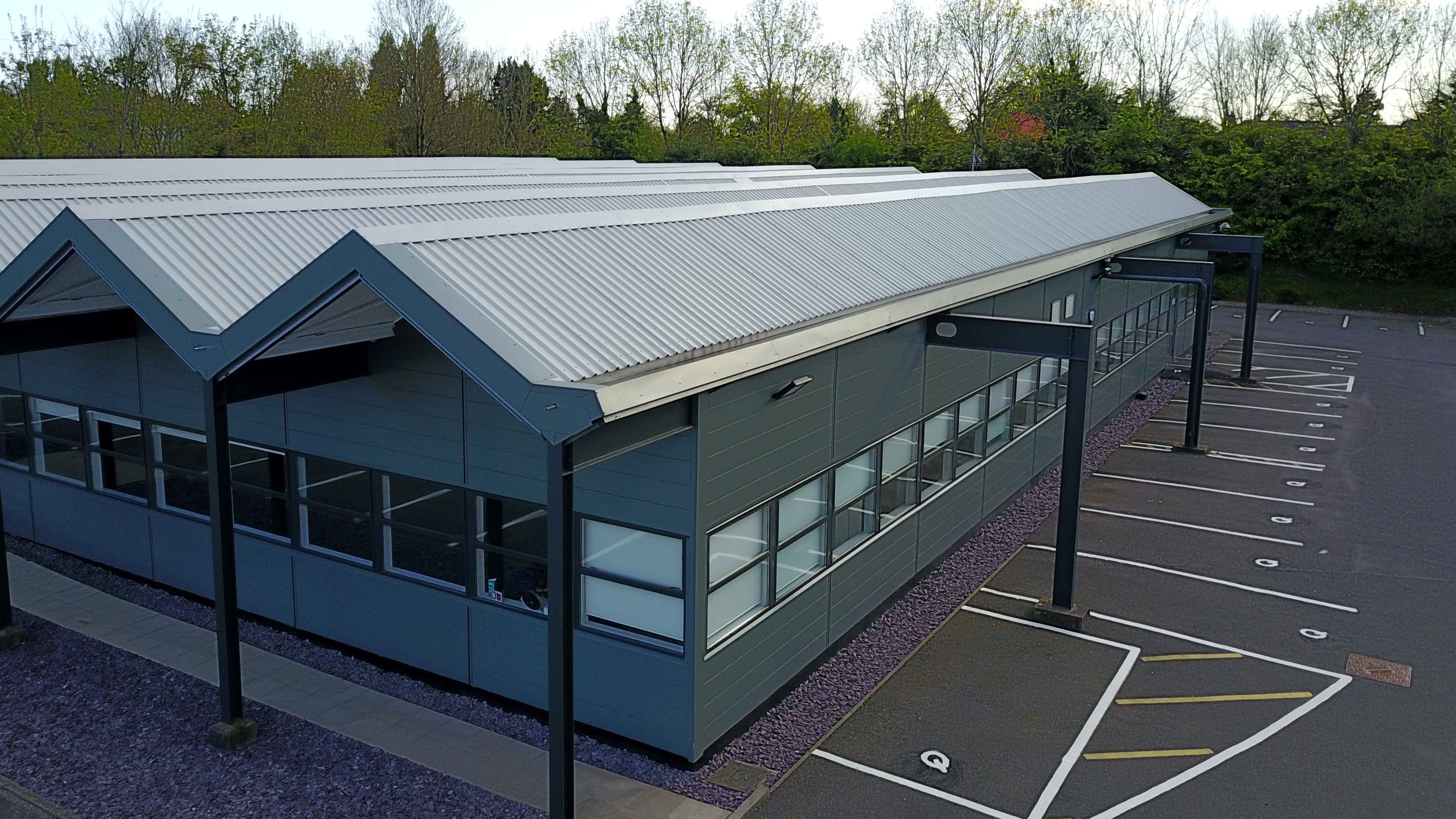 Refresh roof and wall on Cypress House Cardiff